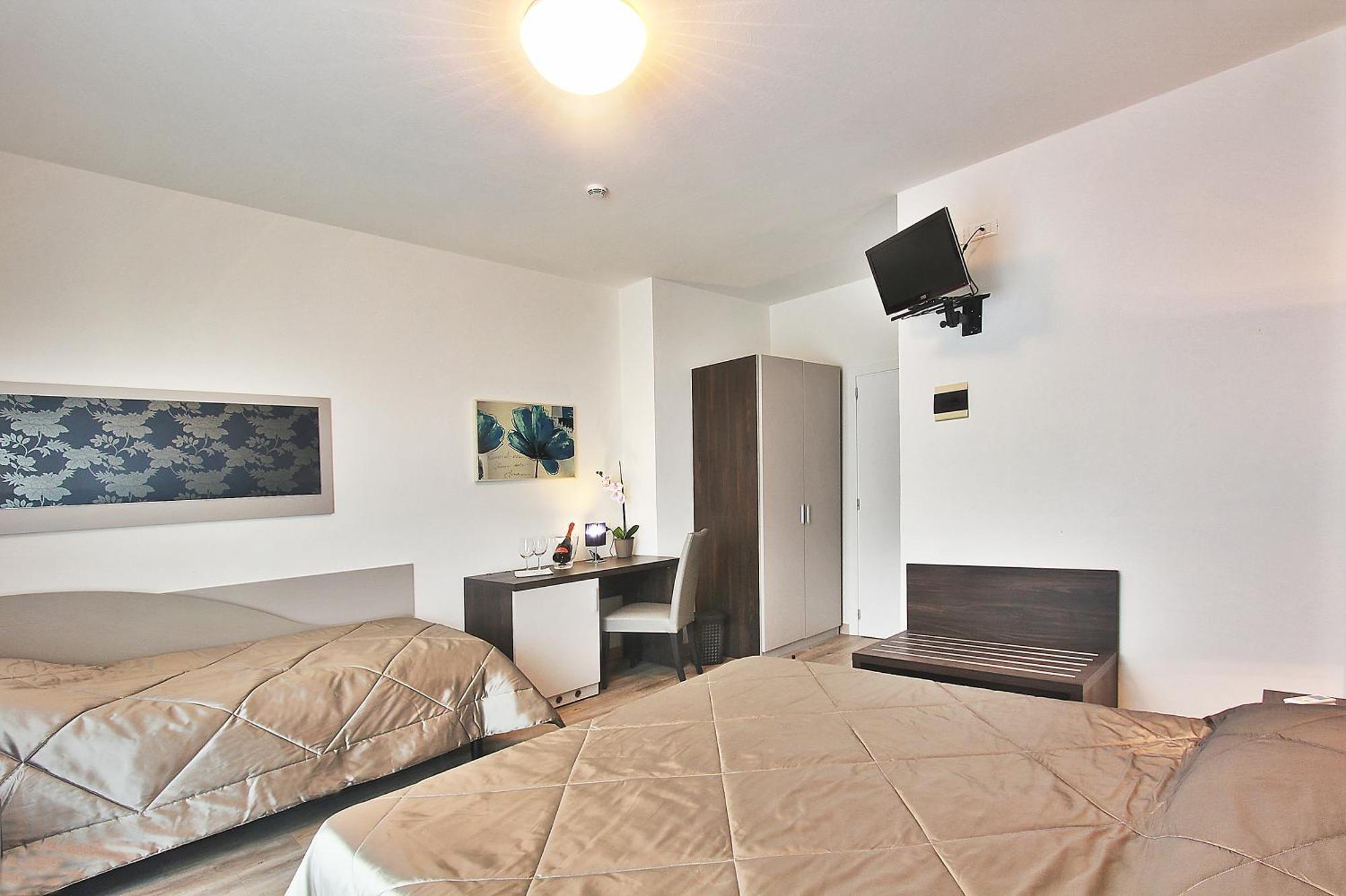 Hotel Gambrinus Lignano Sabbiadoro Rum bild